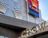 Close view of the modern grand entrance to the Crown Melbourne (Hotel, Entertainment and Casino Complex) building